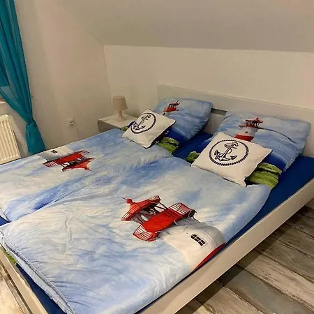 Апартаменты Ferienwohnung Wehender Wind Крумхёрн